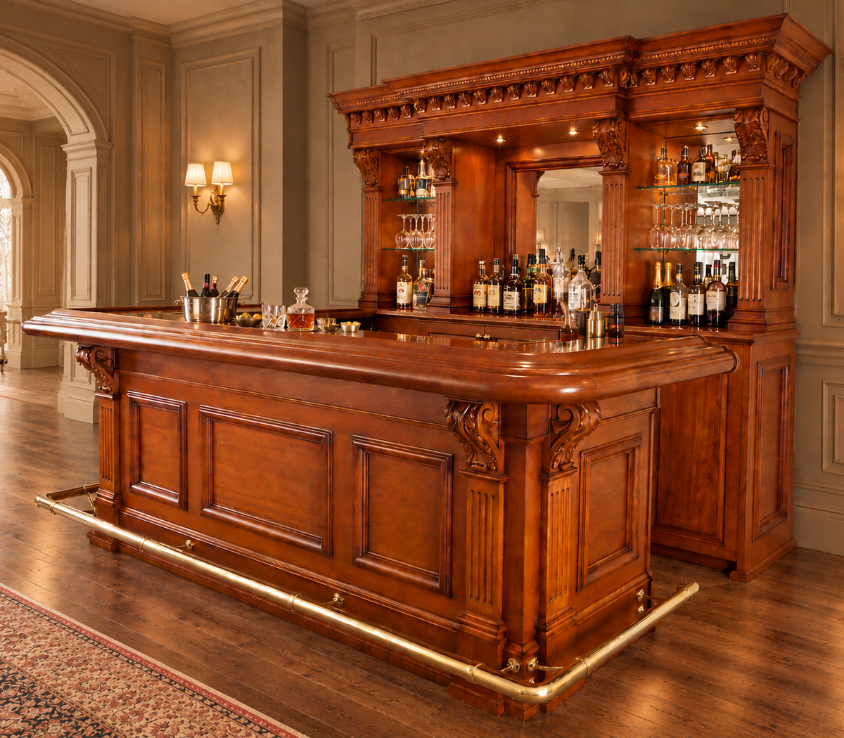 A large traditional wooden bar cabinet with ornate carvings, glass-front shelves stocked with bottles and glasses, and a polished wood counter, shown in a richly decorated room with wood floors and wall molding.
