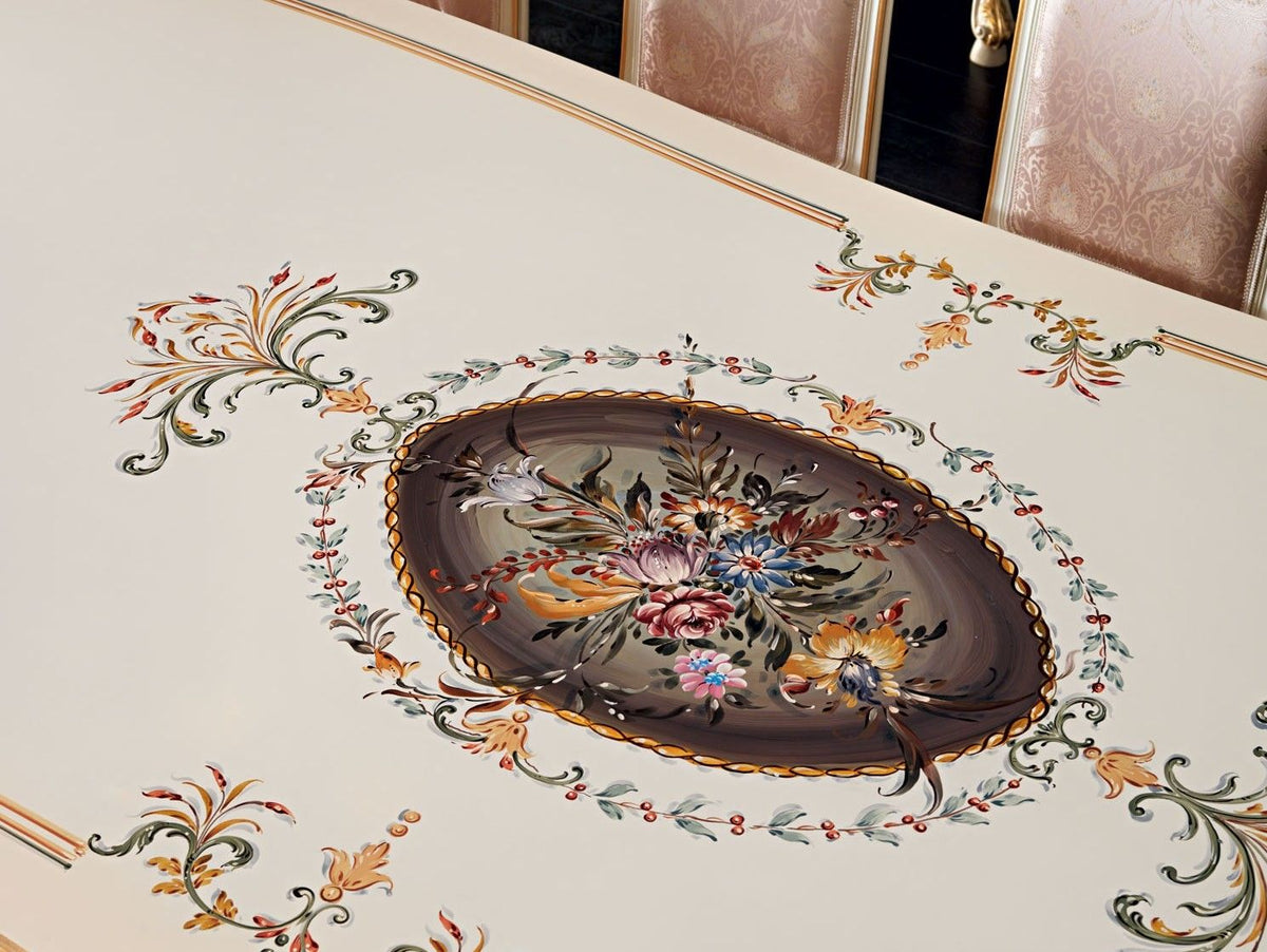 Decorative table with floral centerpiece and intricate patterns