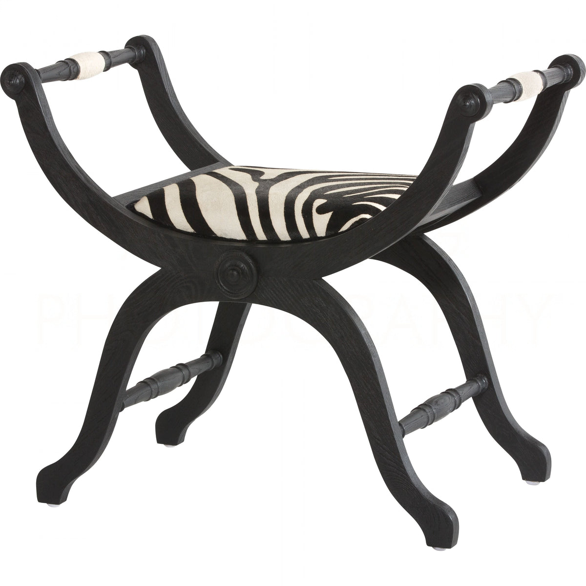 A small bench with a baroque-style design, featuring a black finish and a seat upholstered in black and white zebra fabric.