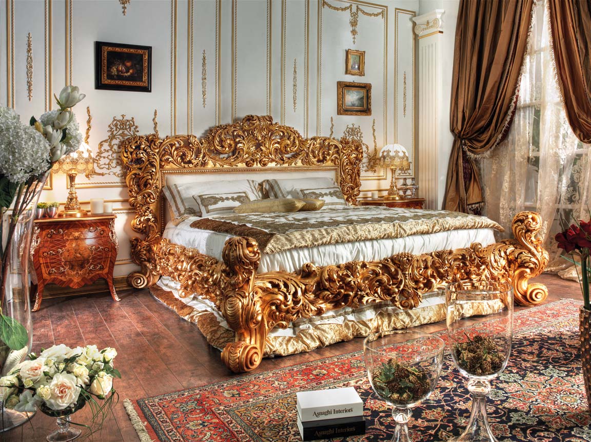 Luxurious bedroom with ornate gold bed and classical decor