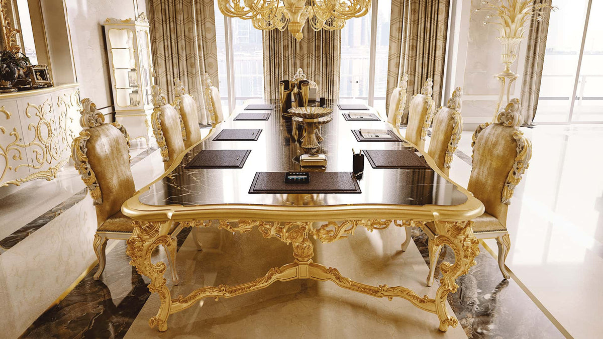 Luxurious dining room with gold table and chairs in a well-lit room.