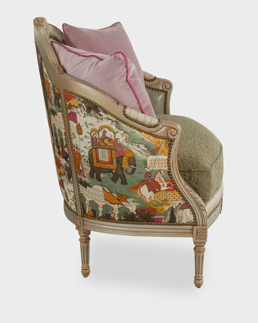 Decorative armchair with intricate patterns and pink cushions on a white background
