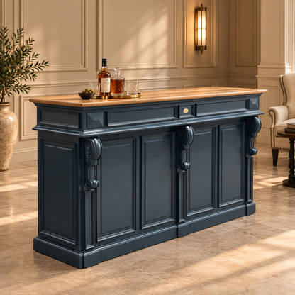 A dark navy blue bar cart with a light oak wood top, styled in a classic elegant room with a bottle and glasses on top.