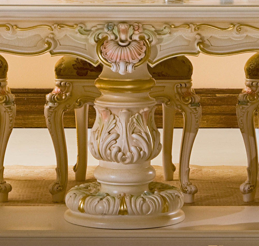 Decorative table with intricate carvings and gold accents