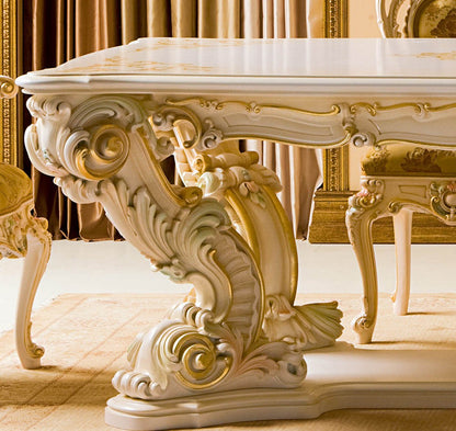 Decorative table with intricate carvings in a luxurious setting