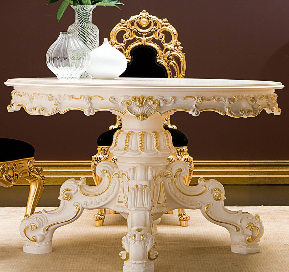 Decorative console table with gold accents and white marble surface