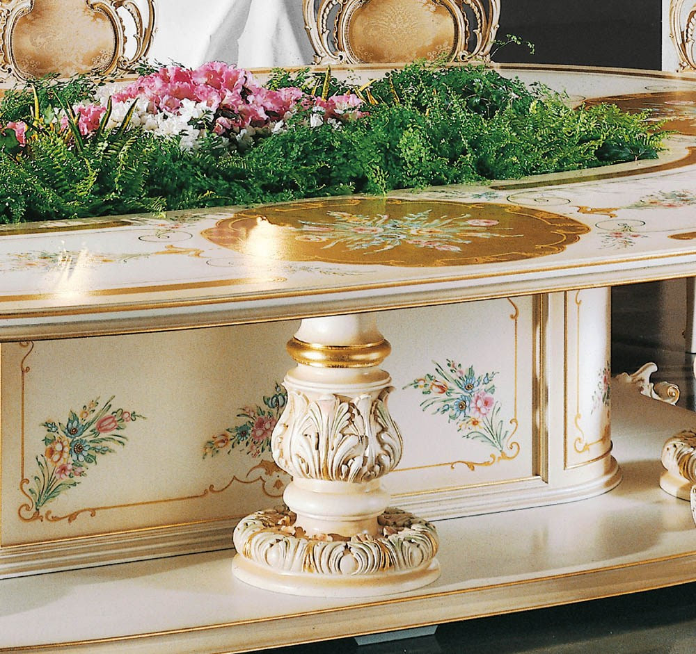 Decorative table with floral arrangements and intricate designs
