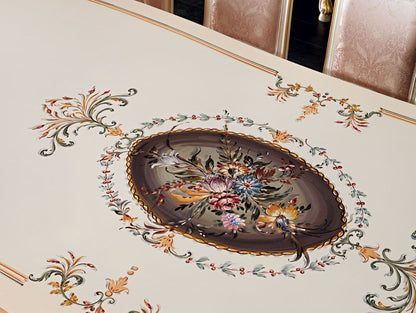 Decorative table with floral centerpiece and intricate patterns