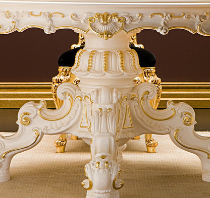 Decorative white and gold table with intricate carvings on a brown background