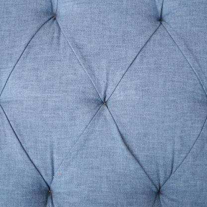 Close-up of a blue cushion with diamond pattern