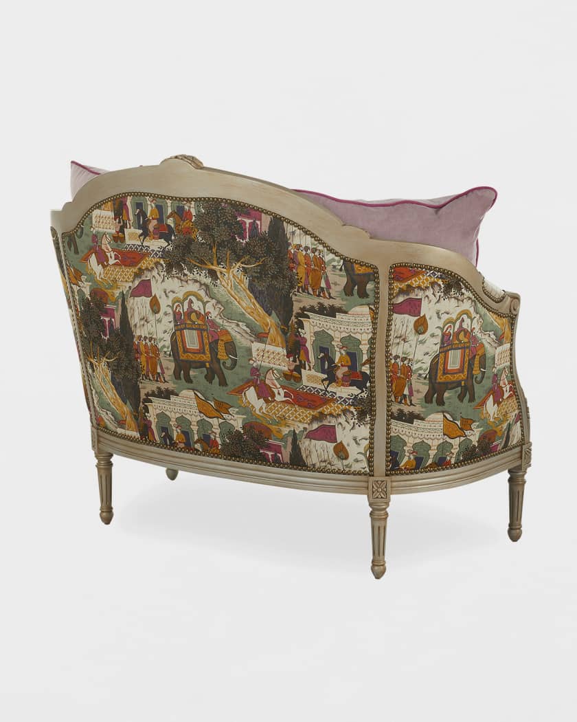 Decorative armchair with intricate pattern on a white background