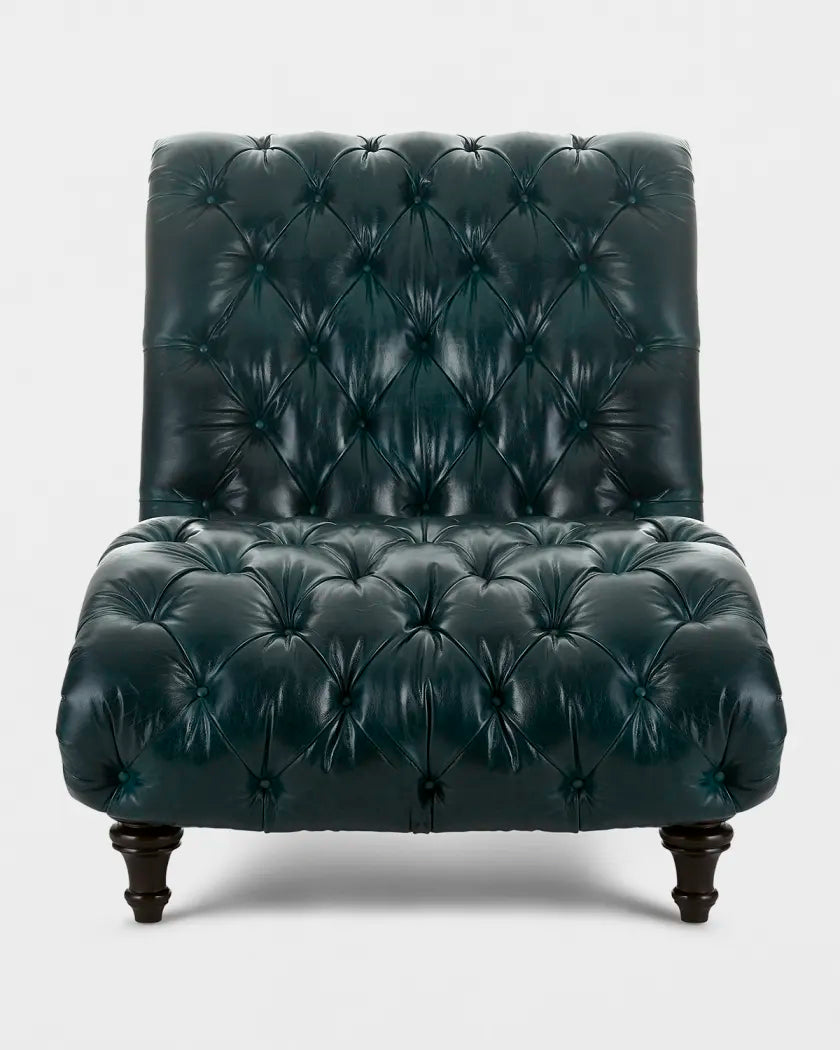Dark green leather armchair with tufted backrest on a white background