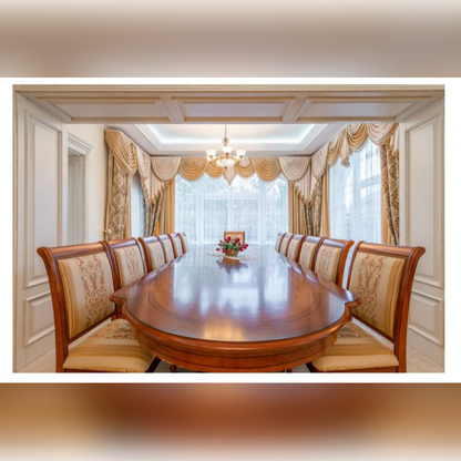 Dining room with a long wooden table and ornate chairs in a well-lit room.