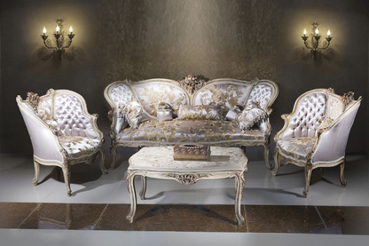 A luxurious Royal Blossom Satin Sofa Set with intricate carvings in antique gold, upholstered in floral satin fabric, alongside a matching center table with an Italian marble top.