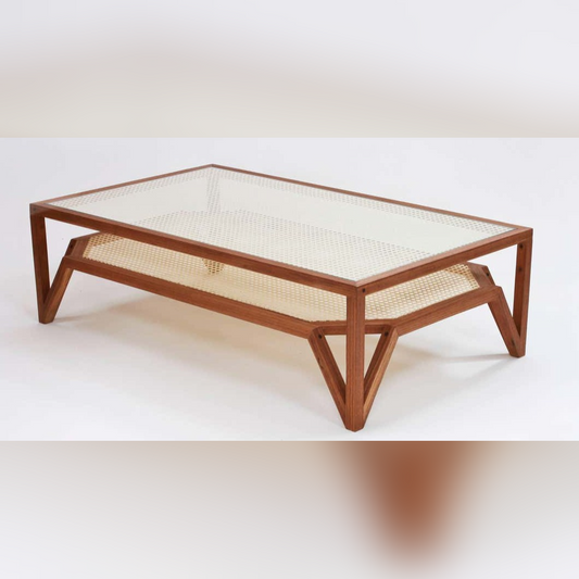 Wooden coffee table with woven top on a white background