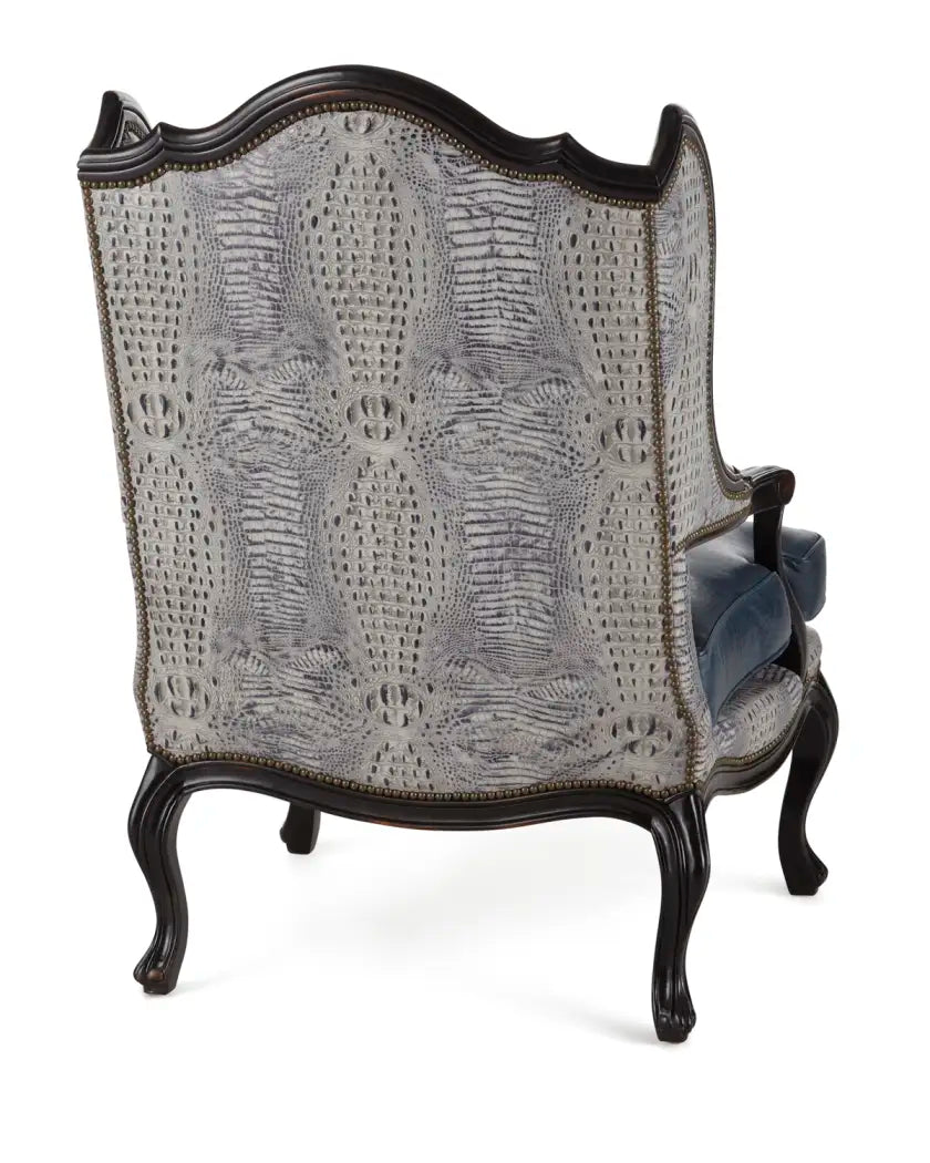 Decorative armchair with intricate backrest design on a white background