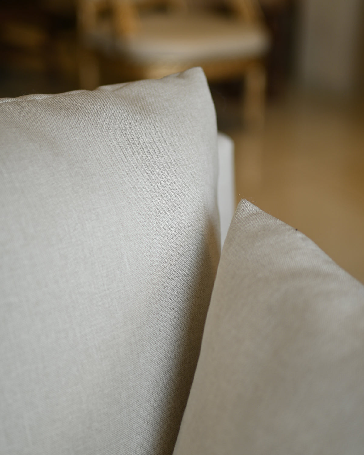 Close-up of light-colored fabric with a blurred background