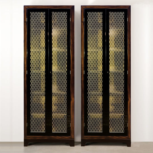 A pair of brown display cabinets with steel mesh doors, with a rich brown finish and black frame.