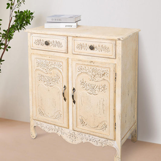 Decorative wooden cabinet with floral carvings on a plain background