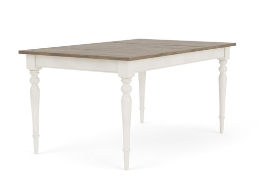 A rectangular coffee table with a distressed wooden top and a white base with turned legs.