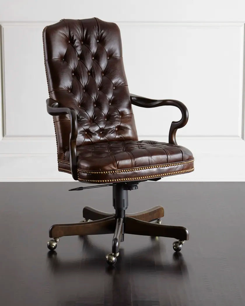 Brown leather office chair with tufted backrest on a reflective surface.
