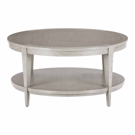 Round coffee table with two shelves on a white background